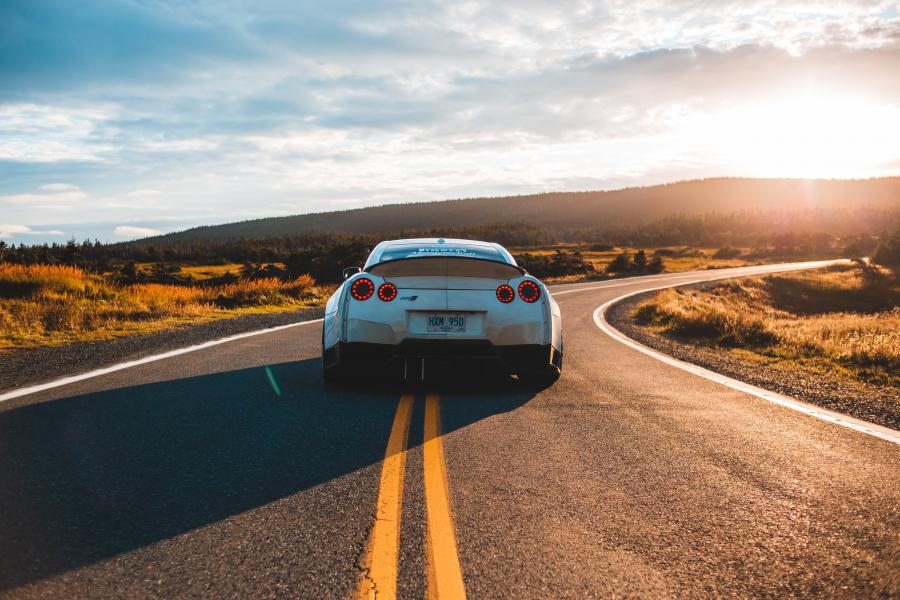 car driving during sunset