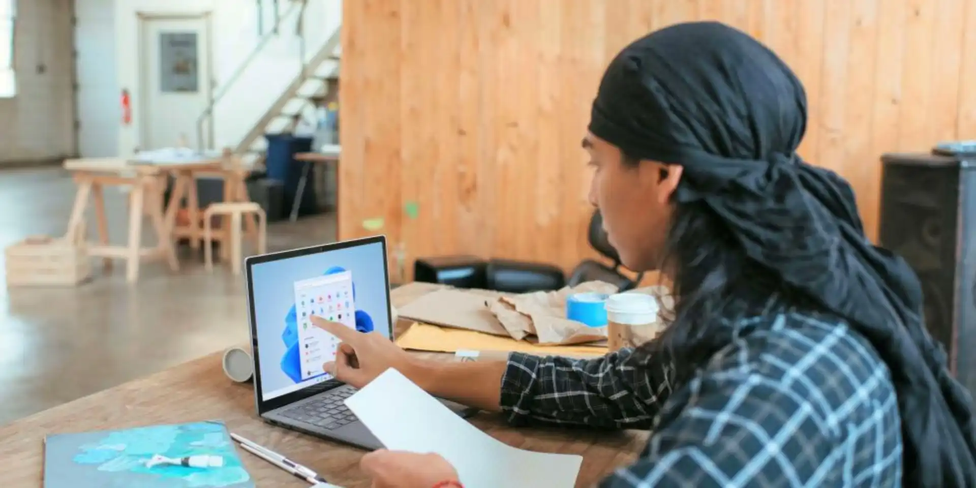 A student in front of a laptop